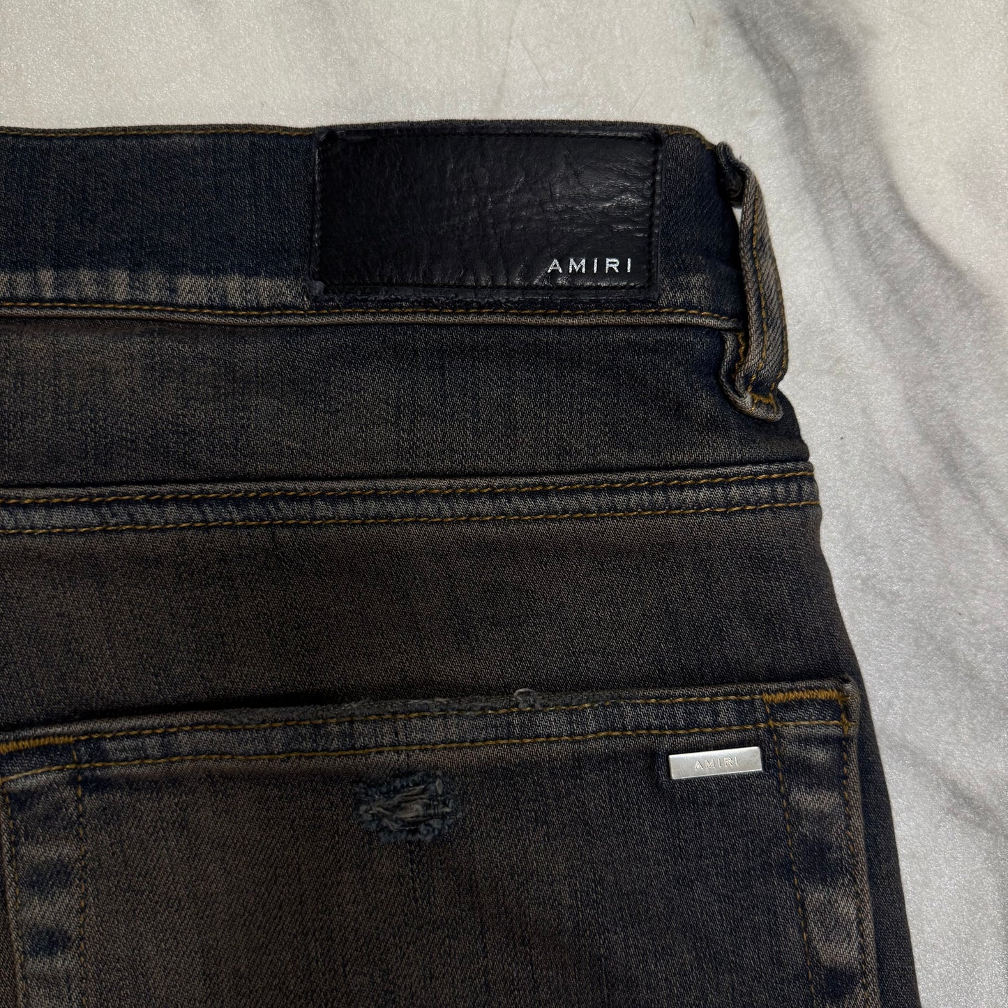 Amiri Dark Navy Distressed Leather Patch Jeans