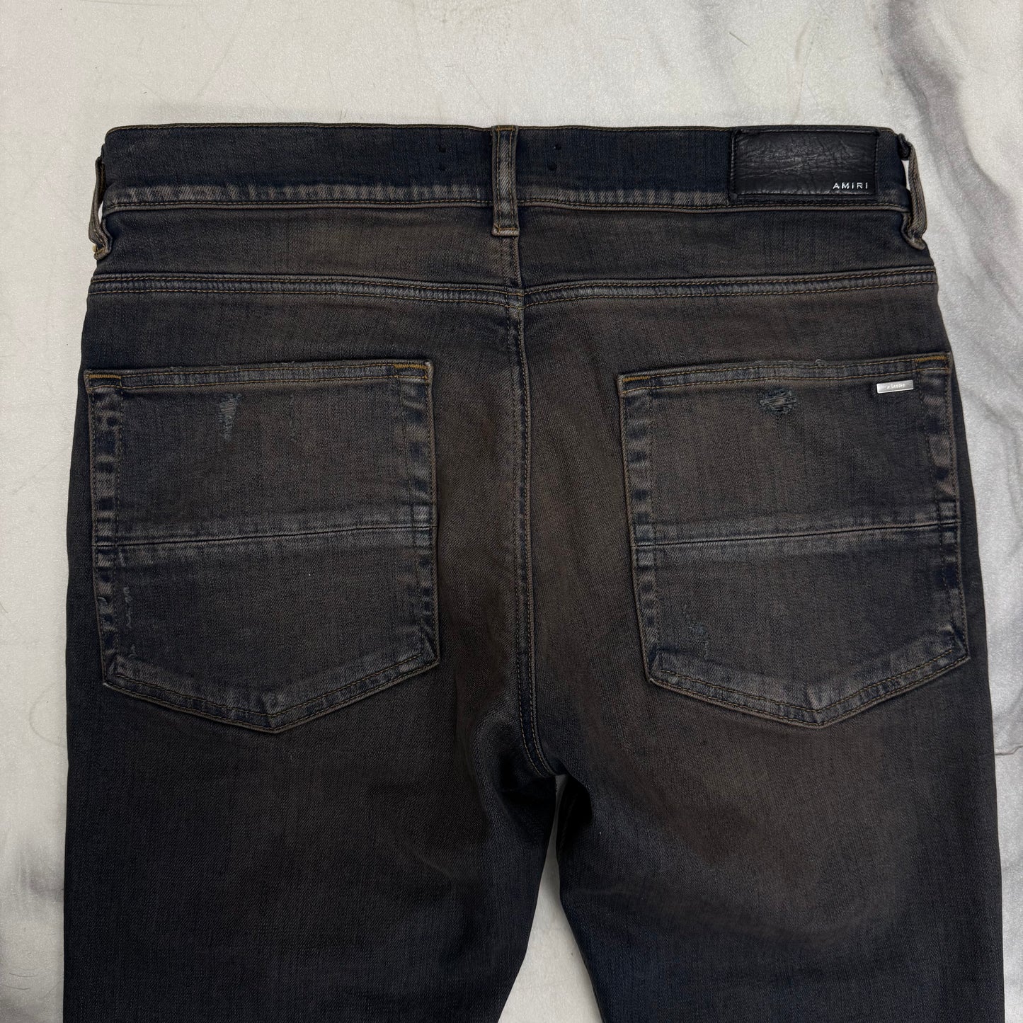 Amiri Dark Navy Distressed Leather Patch Jeans